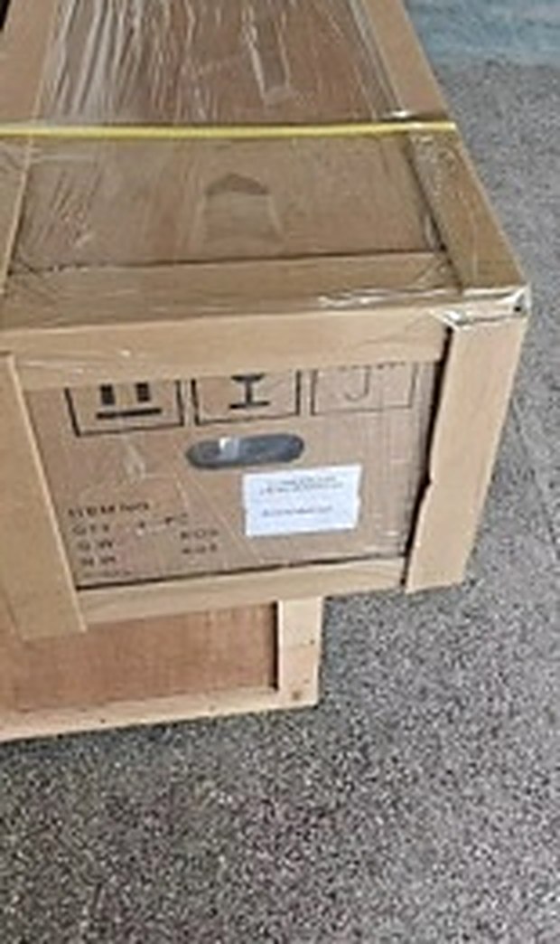 Coverjet crated and strapped for freight shipping in the warehouse